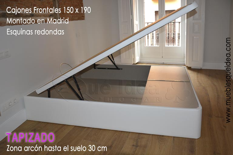 ejemplo de un canapé montado en Madrid abatible tapizado de dos cajones con capacidad para guardar a los pies de la cama