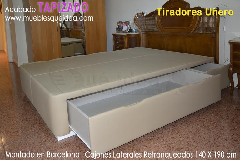 Canapé tapizado de 140 de ancho para cama antigua con cuatro cajones laterales retranqueados con tiradores Uñero montado en Barcelona