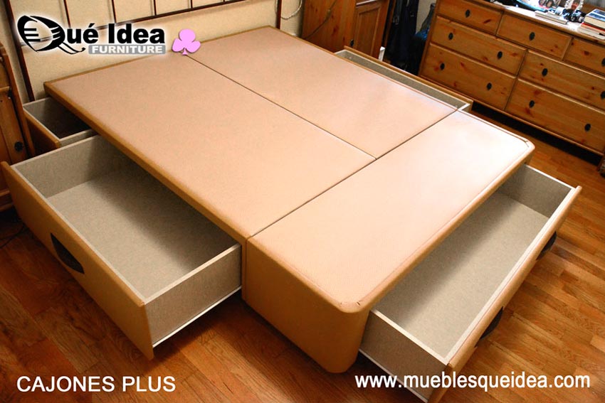 Ejemplo montado de Cama Cajones Plus tapizado color beige con tiradores negros con los cajones grandes abiertos montada en Valencia