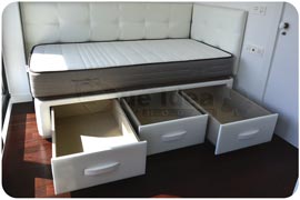 Canapé individual con cajones cabecero y cubre pared