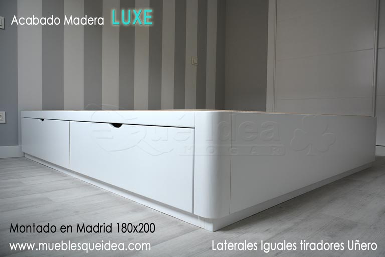 Montaje en Madrid de Canapé de madera lacada con cajones, los tiradores son de tipo Uñero