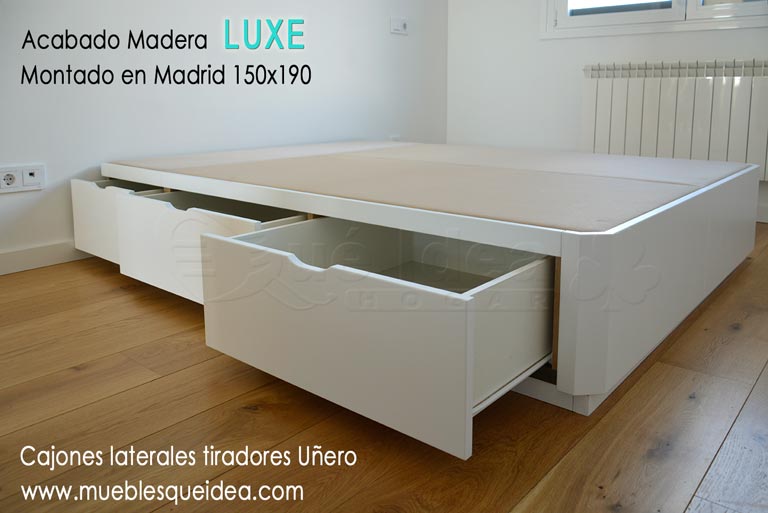 Canapé con cajones laterales y tiradores uñero acabado en madera y montado en Madrid