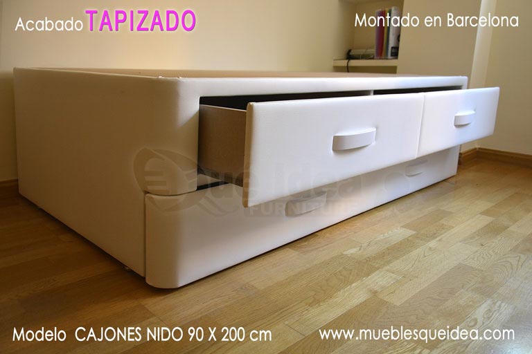 Cama supletoria diván con dos cajones abiertos y canguro nido arrastre de lamas debajo en Cataluña