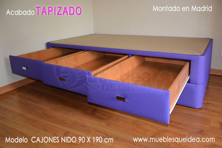 Cama supletoria con tres cajones y nido tapizada color violeta y tiradores especiales montada en Madrid