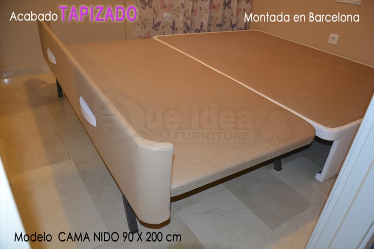 Cama nido vián abierta o desplegada a la misma altura en dormitorio con poco espacio