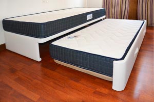 canapé con muchos cajones apertura lateral