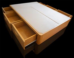 Canapé de madera con cajones laterales