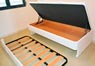 Cama canapé nido de apertura lateral con arrastre de lamas abierto
