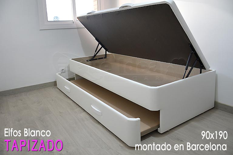 Arcón nido de 90x190 tapizado, en este caso tiene un arrastre de base Tapizada