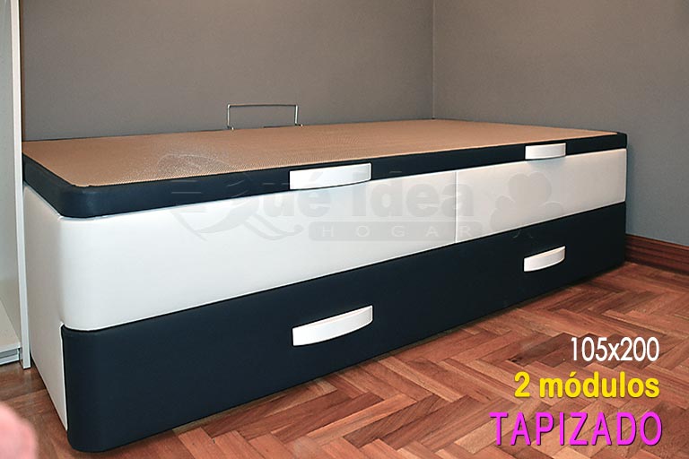 Canapé Nido tapizado en dos colores, blanco para el chasis o cuerpo principal combinado con negro para el frontal del nido y el ribete de la tapa abatible