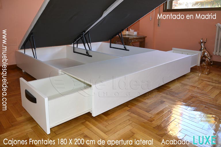 Ejemplo de montaje realizado en Madrid de un canapé con tapa abatible de 180x200 con cajones en los pies de la cama de apertura lateral acabado en madera