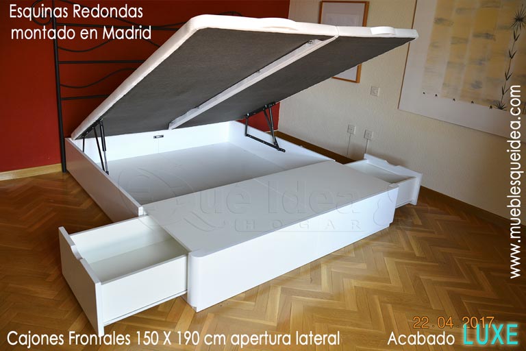 Ejemplo de montaje realizado en Madrid de un canapé abatible de 150x190 en madera con cajones de apertura lateral para almacenaje con tiradores uñero